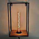 Vintage industriële Lichy lamp met zichtbaar gloeidraad in metalen frame.